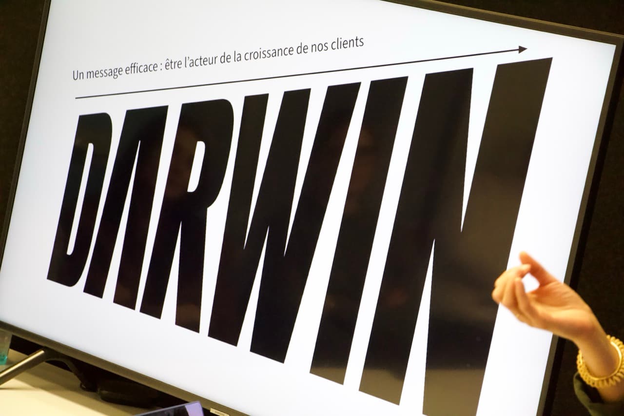 Écran de présentation DARWIN affichant la promesse de l'agence, être l'acteur de la croissance de ses clients